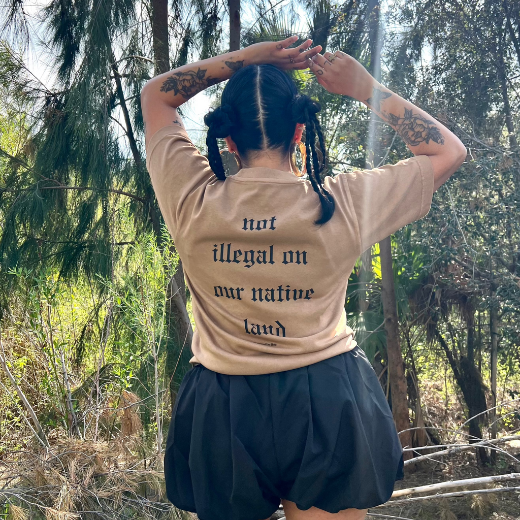 Not illegal on our native land tan tee