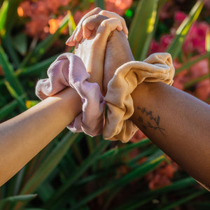 Models are wearing 2 scrunchies (1 pink and 1 orange/nude). Made from dead stock fabric.