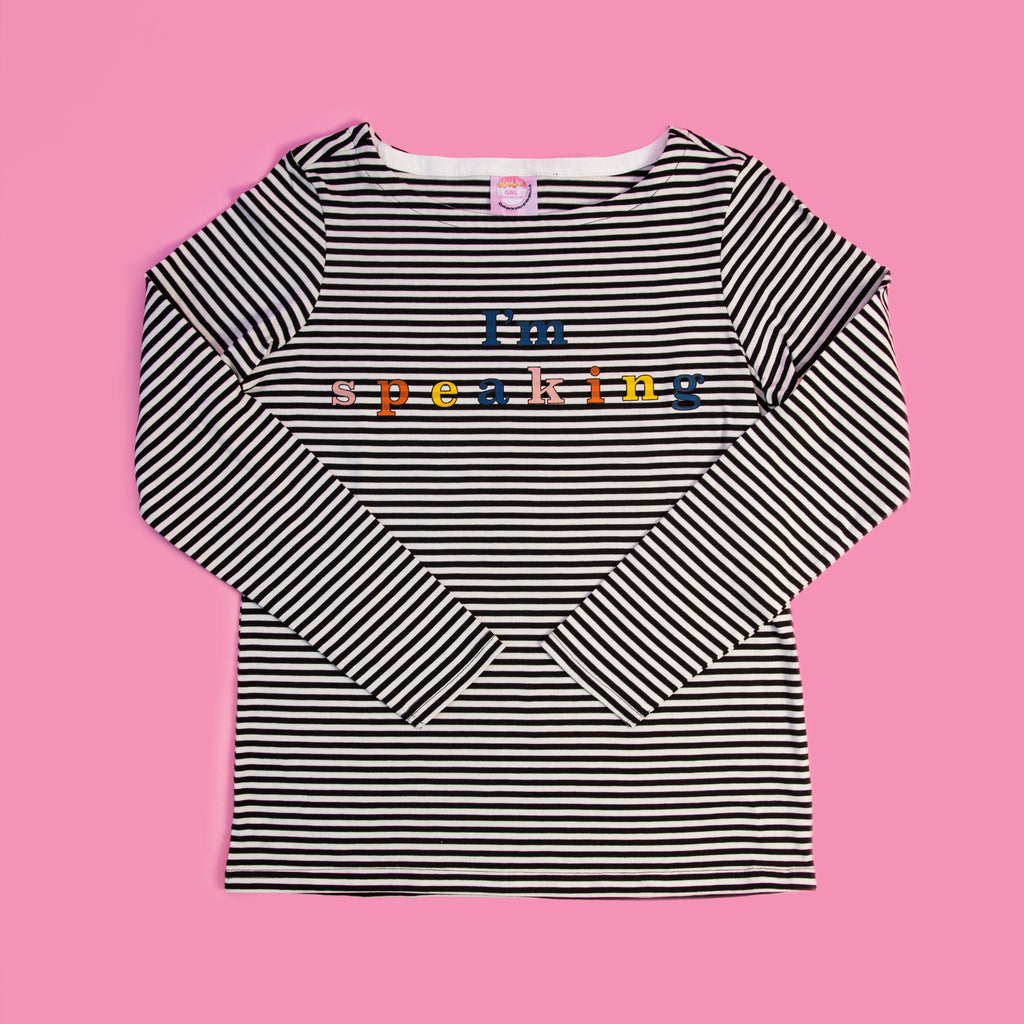Black and white striped Pre-shrunk 100% Organic Cotton long sleeve tee Men's/ unisex sizing, true to size for you would normally wear in a men's tee "I'm speaking" printed on front in multiple fall colors.