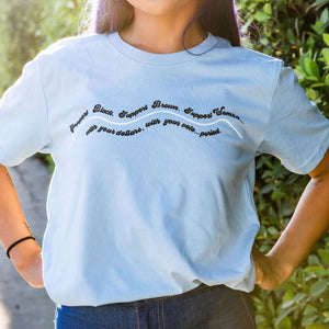 Model is wearing support Black, Brown, Womxn Tee in blue 100% Cotton Unisex tee.  Pre-shrunk, regular fit, crew neck, true to size.