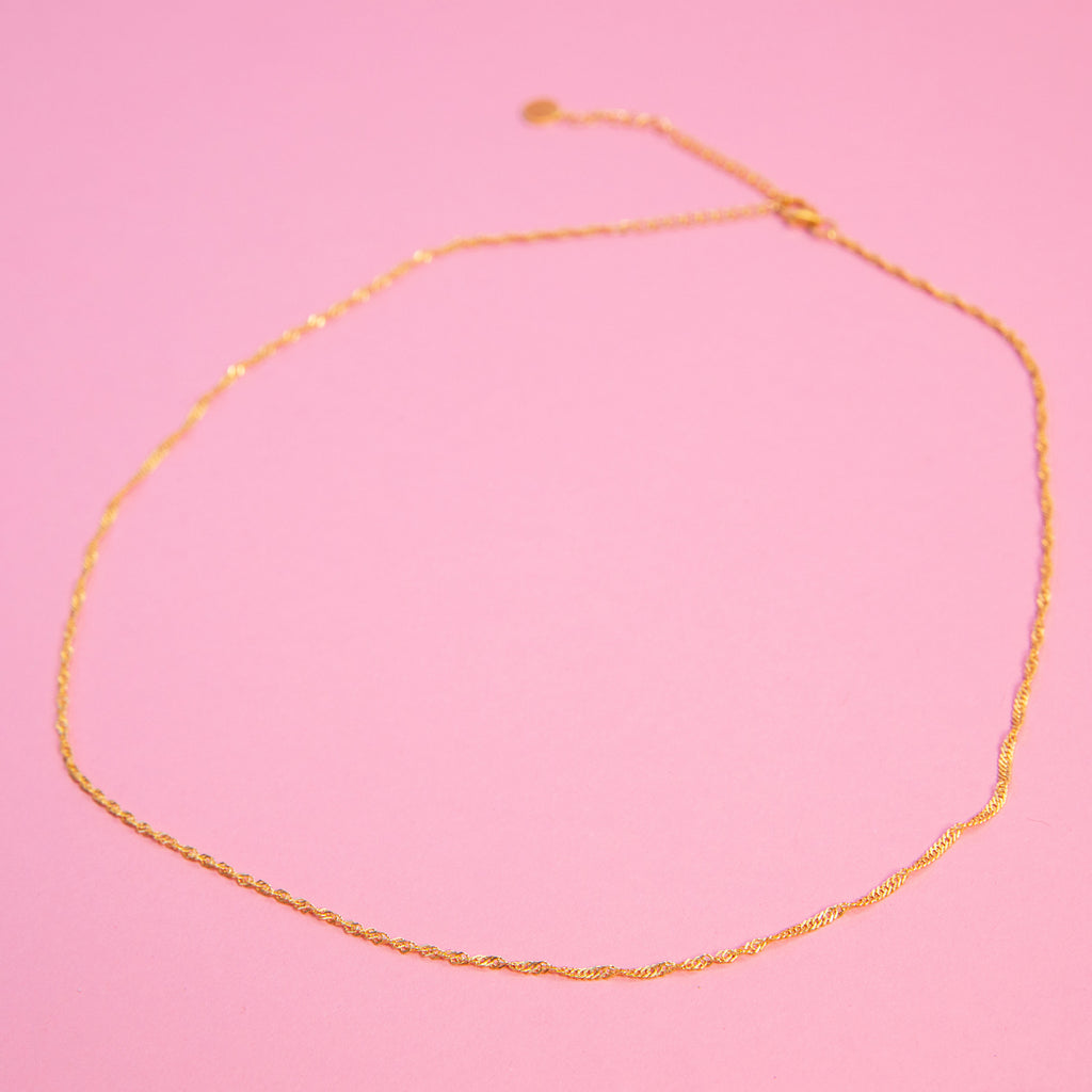 Sterling Silver, 22k gold plated, Chain is 16 inches with a 2.75 inch sizing extension 