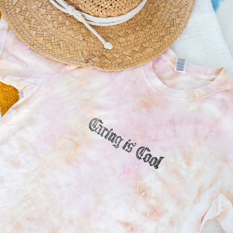 Caring is Cool tee shirt. 100% Organic Cotton Unisex Tee. Pre-shrunk, regular fit, crew neck, true to size. Sizes XS-3XL